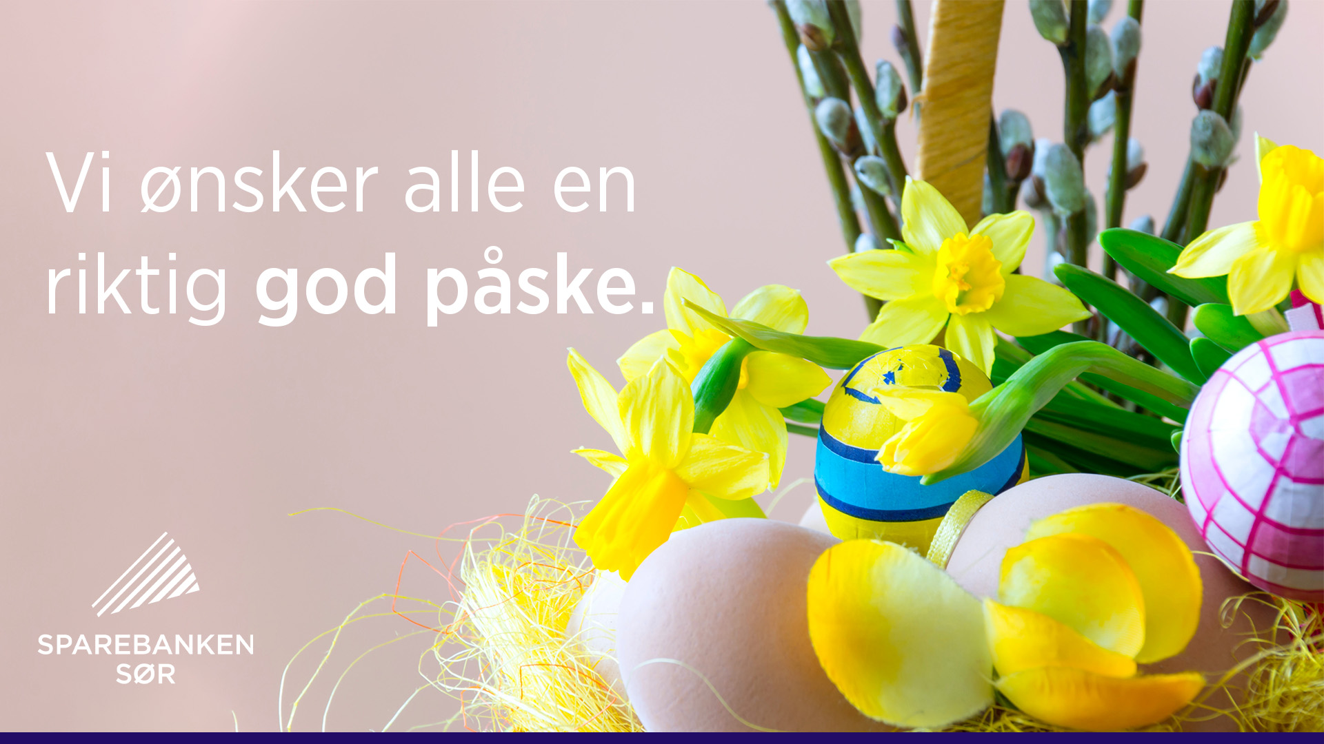 Påskepyntbilde med skrift som ønsker alle en god påske